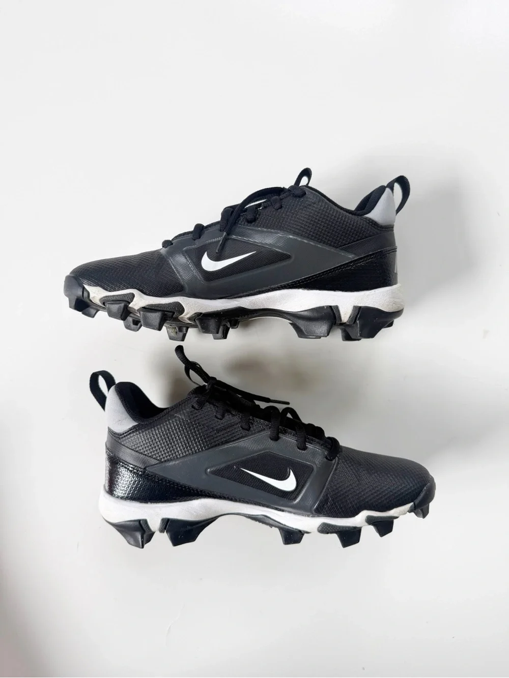 Nike Kids Black and Silver Cleats